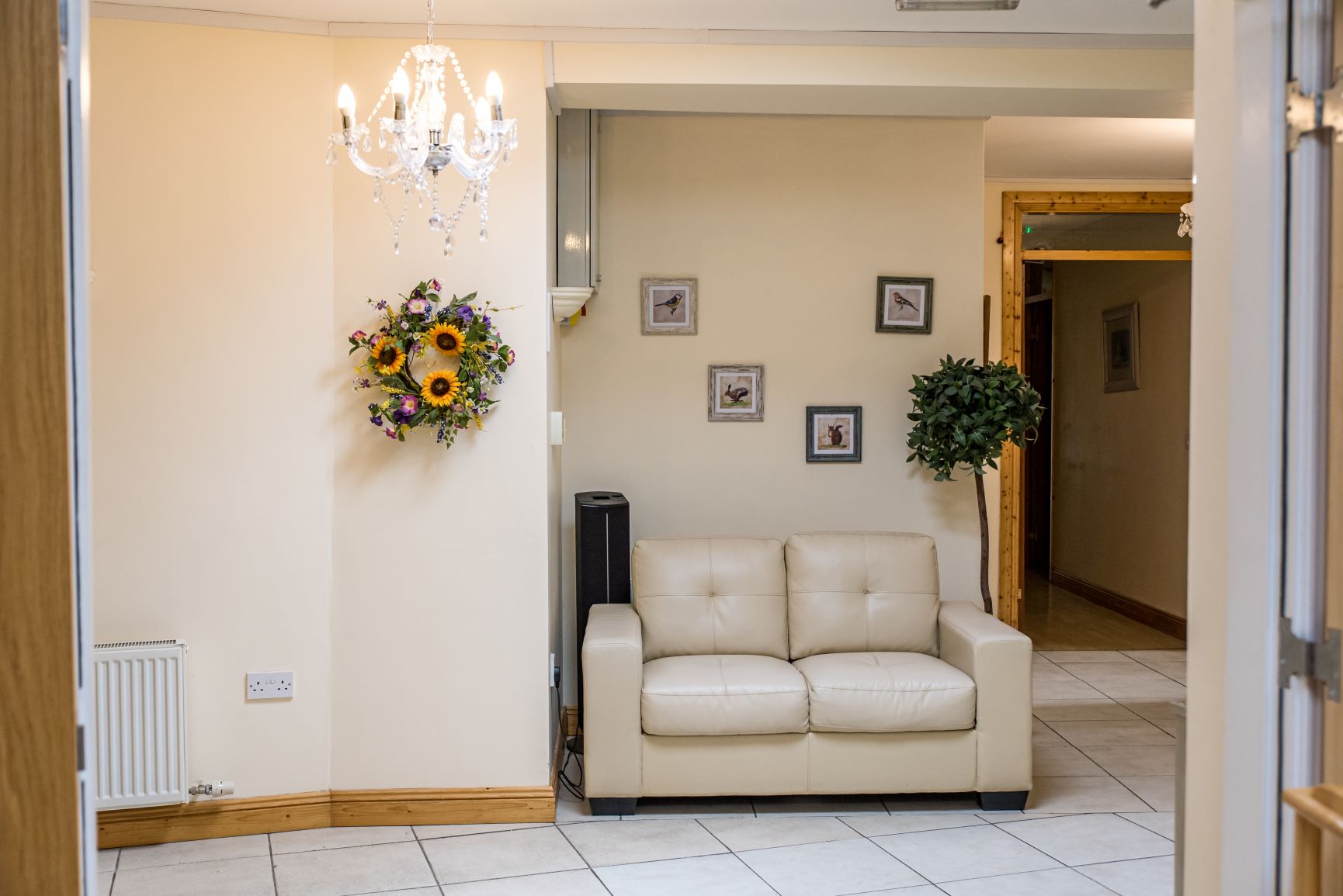 The main foyer at the entrance with cozy two-seater sofa and tasteful decor.